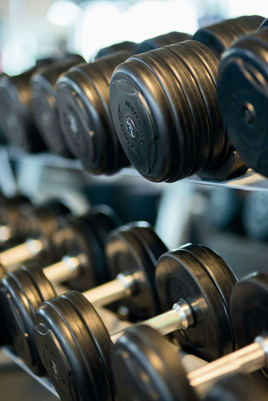 Dumbells representing a home gym setup.